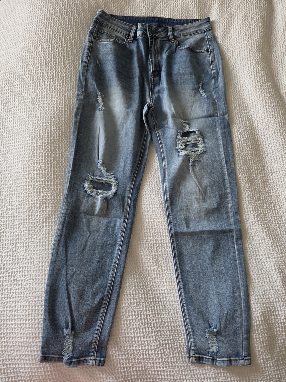 Women's Distressed Light Blue Jeans